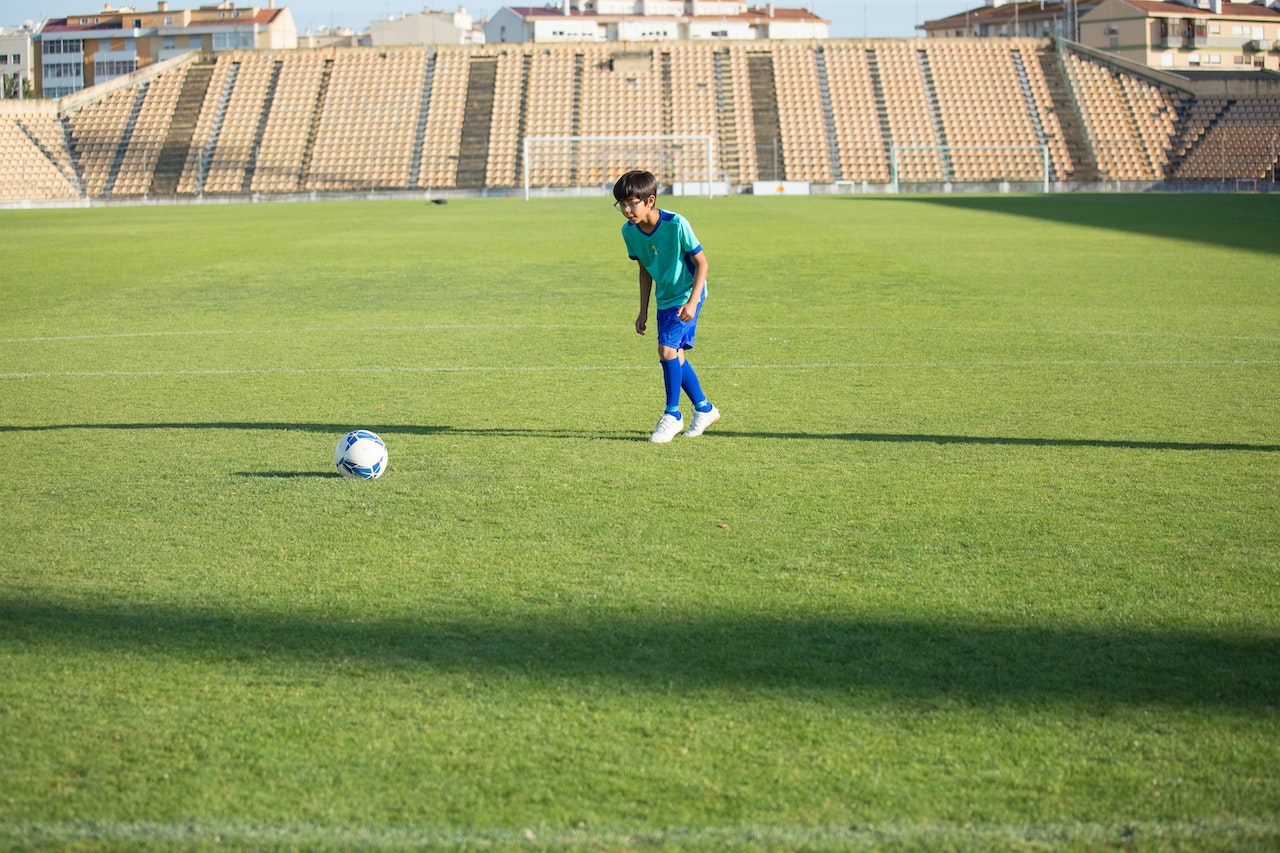 Kid playing football