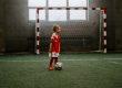 kid playing football