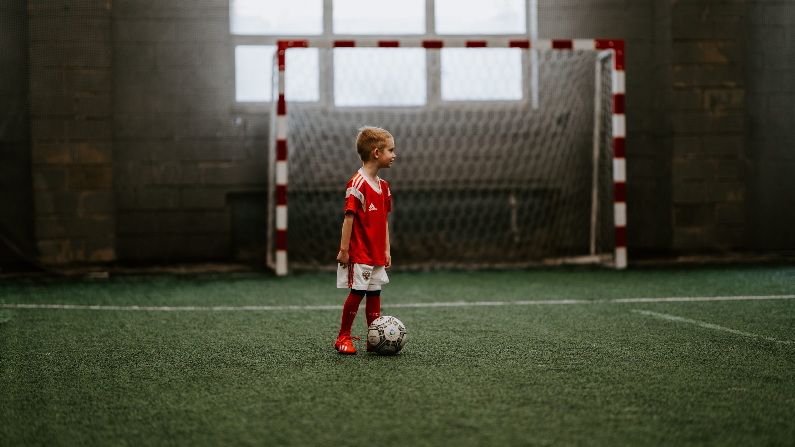 kid playing football