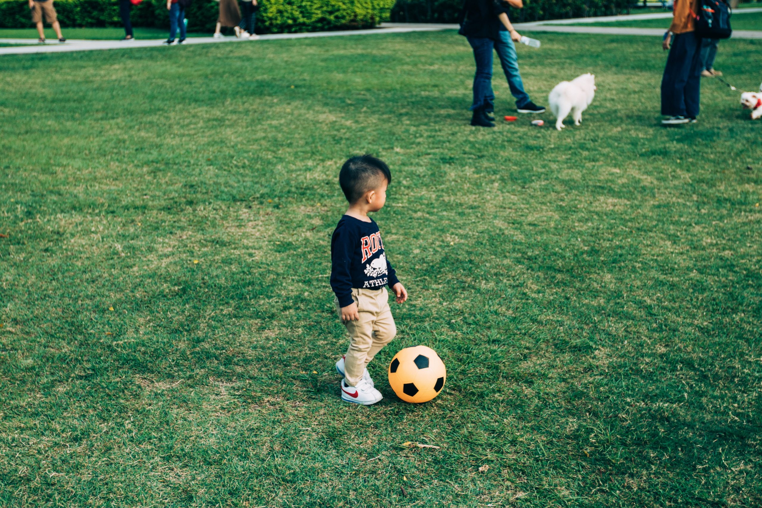 kid playing football